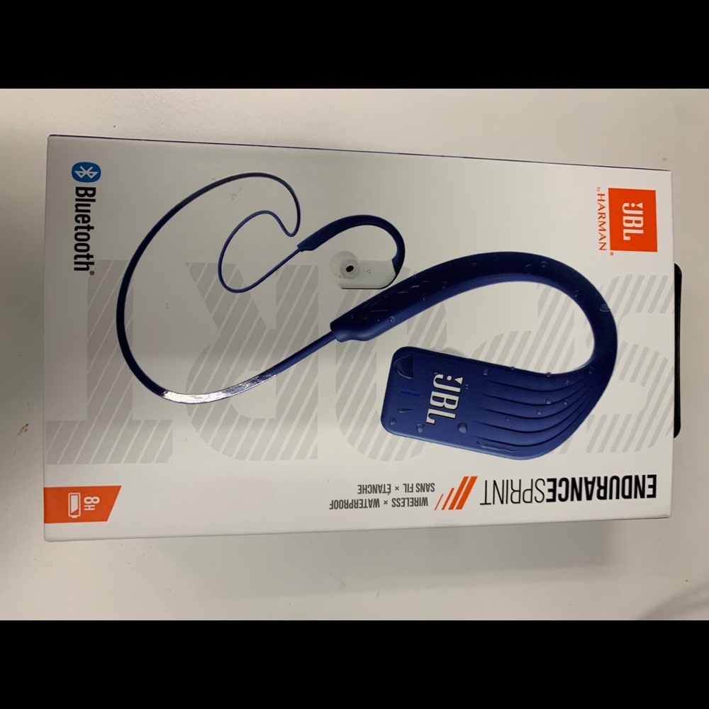 Wireless JBL in-Ear sports headphones.